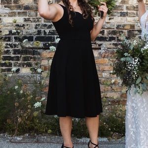 Medium, square neckline, tea length, zipper back.